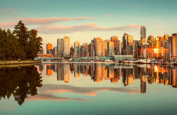 istock Vancouver skyline with Stanley Park at sunset, British Columbia, Canada 687738648