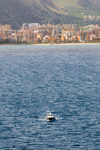 Pilot Boat with Palermo in the background stock photo