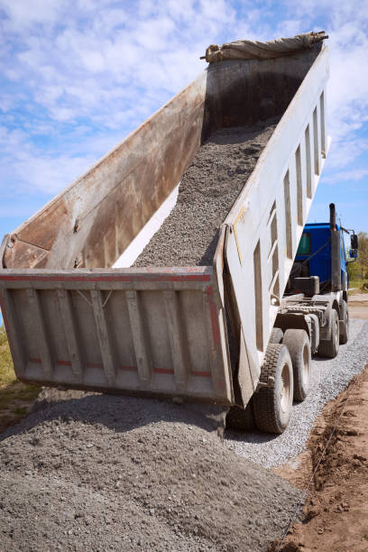 istock Unloading ballast on the road on a sunny day. 687745026
