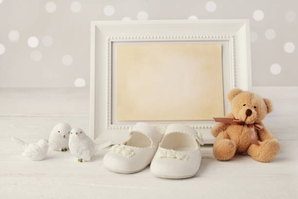 baby shoes close-up of baby shoes announcement message photos stock pictures, royalty-free photos & images