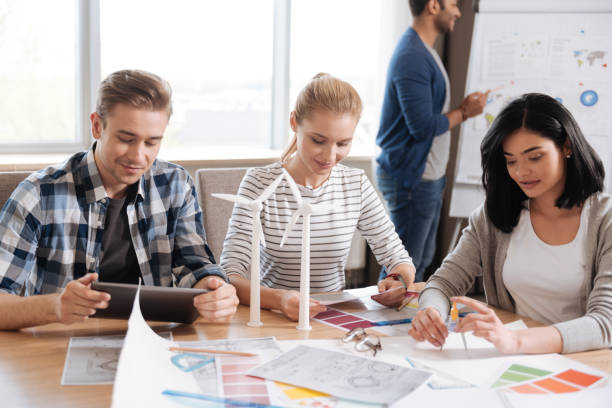 istock Nice pleasant colleagues concentrating on their tasks 687763620