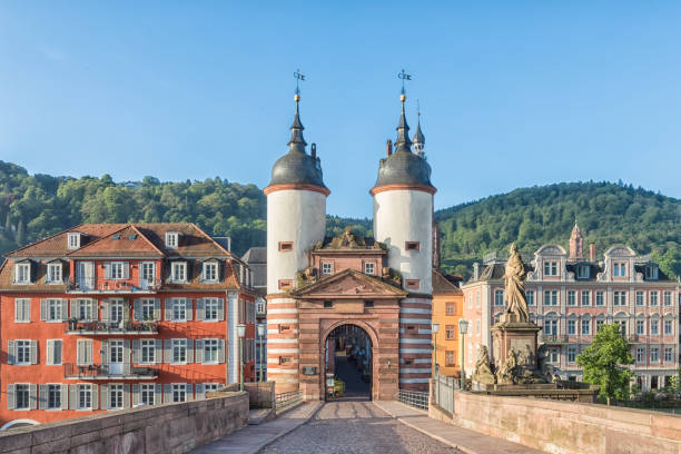 Old Bridge Gate in Heidelberg, Germany Old Bridge Gate on Karl Theodor Bridge in Heidelberg, Baden-Wurttemberg, Germany heidelberg germany photos stock pictures, royalty-free photos & images