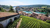 istock Schaffhausen, Switzerland. Panoramic view of the old town, Munot fortress overlooking Rhine River. A city on the Upper Rhine in northern Switzerland. The old town has many fine Renaissance buildings, fountains and decorations. 687774288