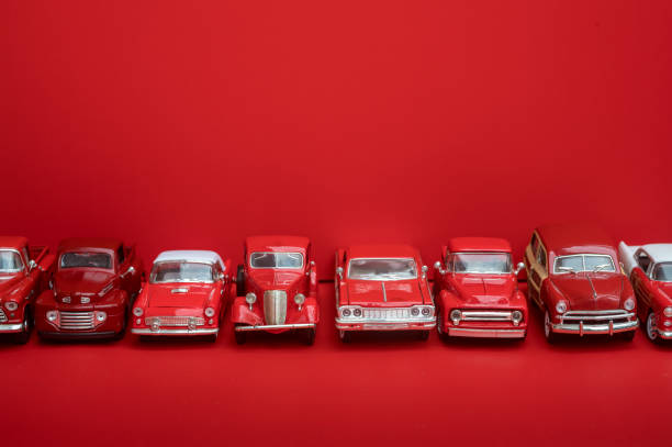 Diecast car collection View from above of diecast vintage car and pick up truck collection. Variety of models, shapes and types, all red. toy car stock pictures, royalty-free photos & images