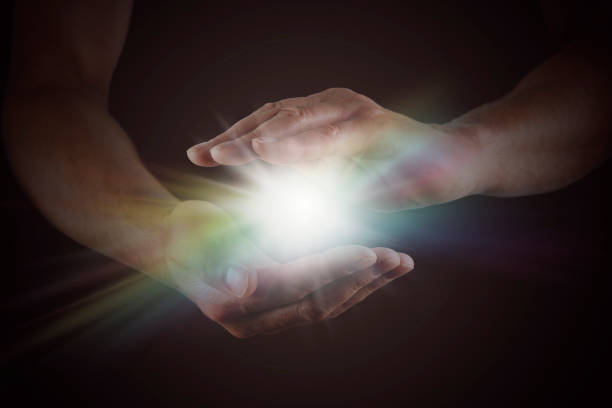 Long haired white male with a mystical glowing orb to signify power, magic, spirituality and so forth