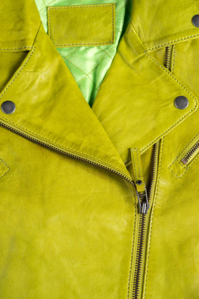 istock Green leather jacket. Leather jacket macro details. Jacket zippers and pockets 687787980