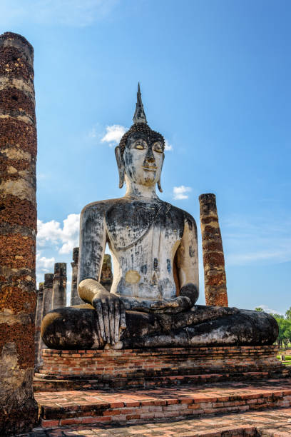 istock Buddha statue among the ruins 687794816
