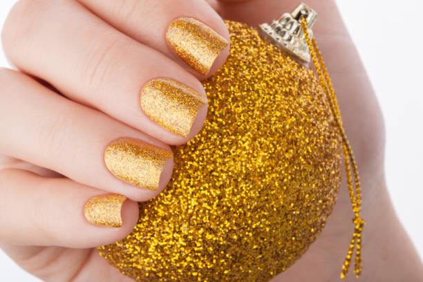 istock Beautiful golden manicure. 687794882