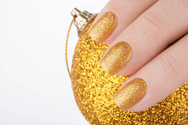 istock Beautiful golden manicure. 687795294