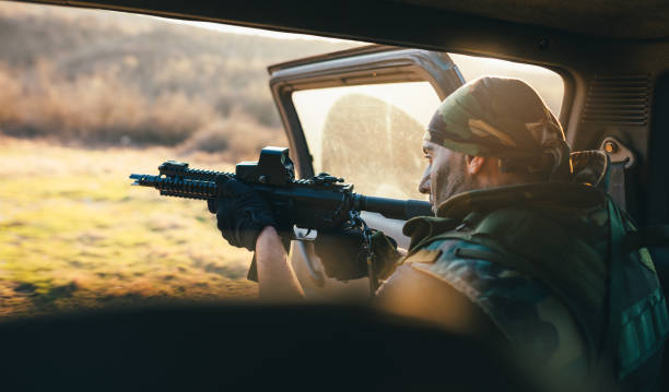 istock Soldier in back of vehicle 687795508