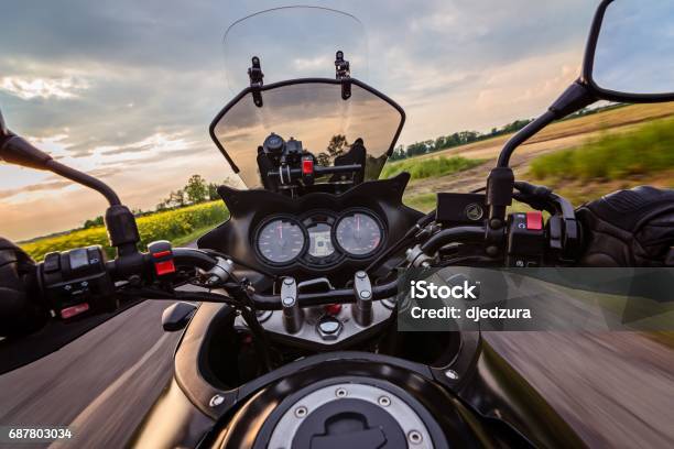 Man Driving His Motorcycle On Asphalt Country Road Stock Photo - Download Image Now - Motorcycle, Dashboard - Vehicle Part, Personal Perspective