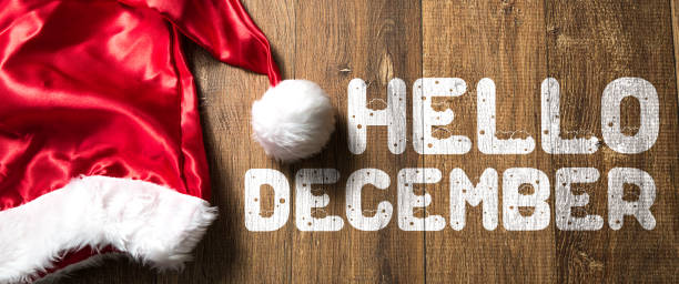 Hello December sign Hello December written on wooden background with Santa Hat december stock pictures, royalty-free photos & images