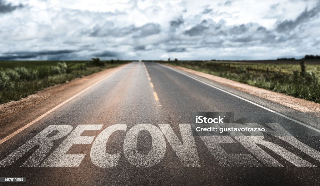 Recovery sign Recovery written on desert road Recovery Stock Photo