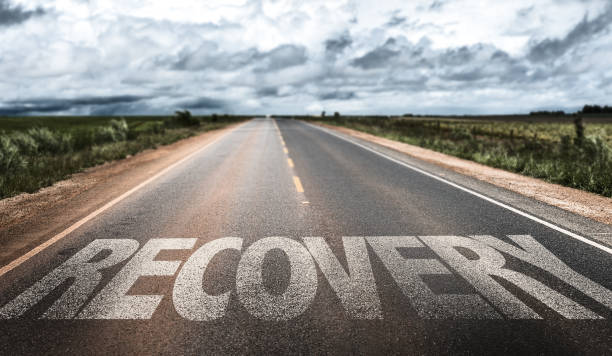 Recovery sign Recovery written on desert road dependency stock pictures, royalty-free photos & images