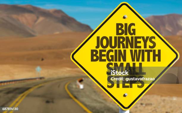 Big Journeys Begin With Small Steps Sign With Sky Background Stock Photo - Download Image Now