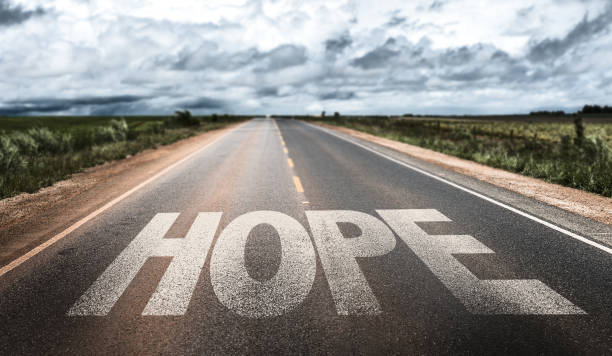 Hope sign Hope written on rural road hopelessness stock pictures, royalty-free photos & images