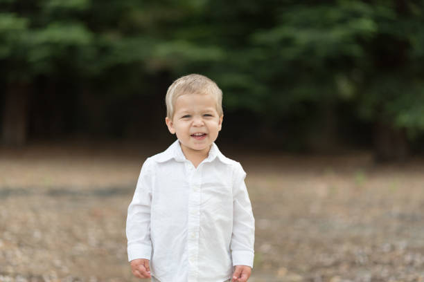 istock Cute Happy Toddler in White Shirt 687817062