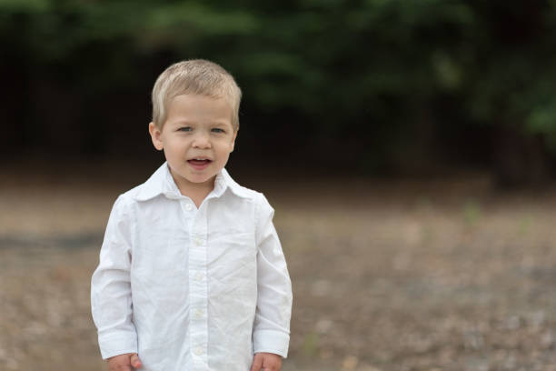istock Cute Happy Toddler in White Shirt 687817068