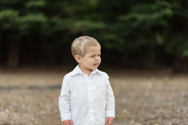 istock Cute Happy Toddler in White Shirt 687817080