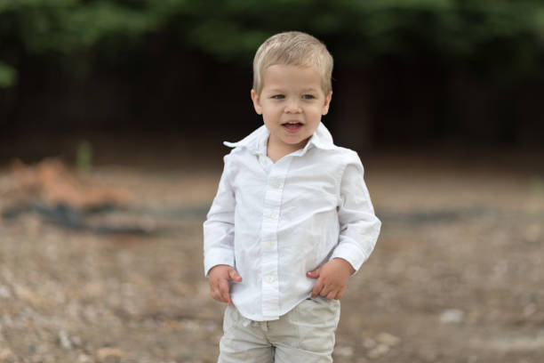 istock Cute Happy Toddler in White Shirt 687817088
