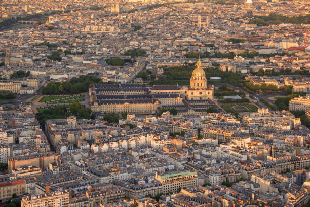 istock Golden sunset over paris: Les invalides palace viewed from Eiffel tower 687819912