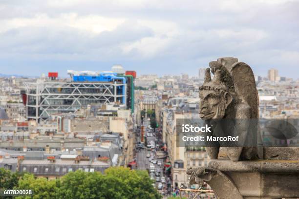 Notre Dames Gargoyle Pompidou Center And Parisian Cityscape France Stock Photo - Download Image Now