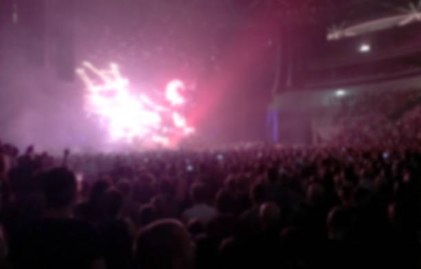 istock blurred concert background light show 687827602