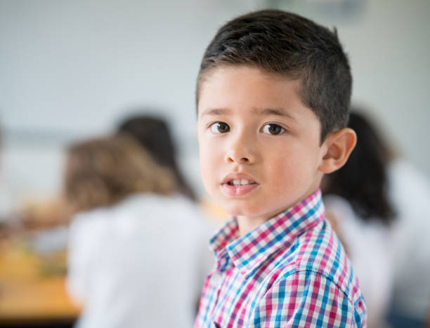 istock Portrait of a young student in class at the school 687830620