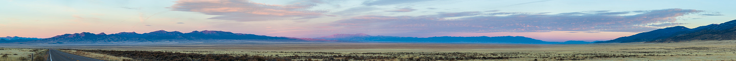 XXXL stitched panorama. The peaceful sunrise over the desert and remote mountains in Nevada, USA, North America