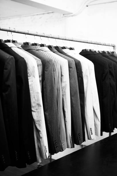 istock Suits jacket hanging stacked on hanger,black and white 687832932