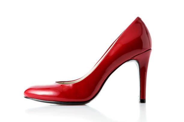 istock Red high heel fashion shoe on background 687836294