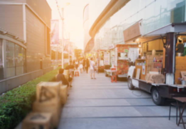 istock Abstract blurred background of food trucks. 687843784