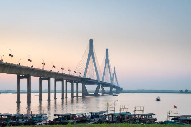 istock dongting lake bridge at dusk 687846086