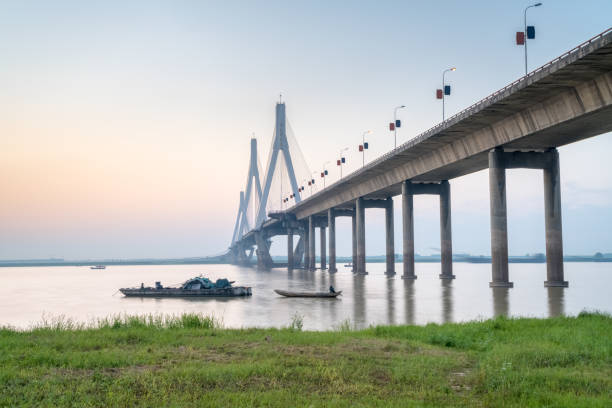 istock dongting lake bridge at dusk 687846092