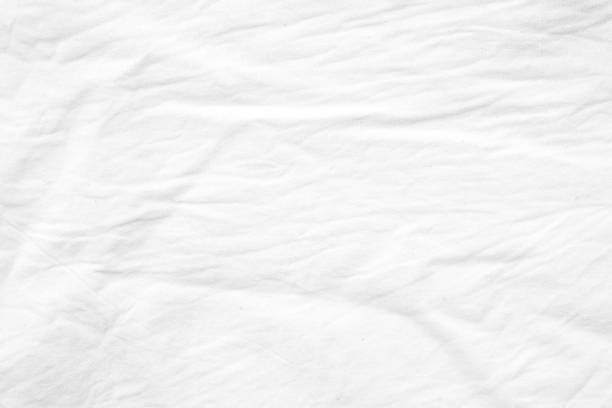 istock Wrinkled white cotton canvas fabric textured background, wallpaper 687847232