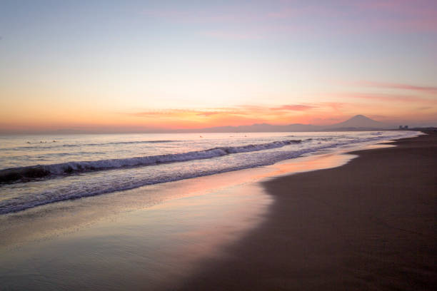 Beautiful sunset on the beach and Mt Fuji