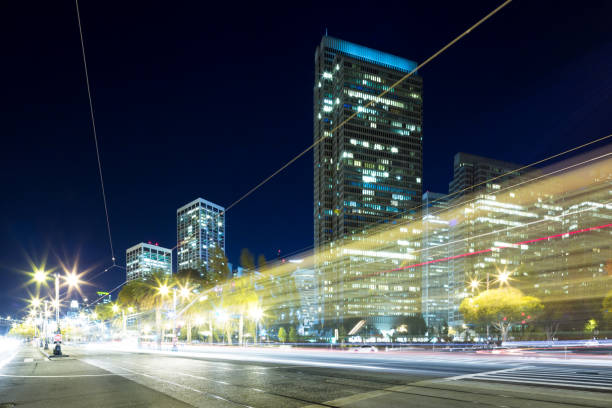 istock traffic on road in modern city at night 687863948
