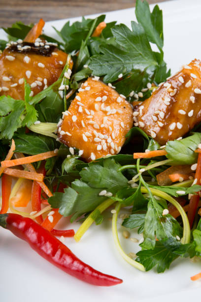 istock Salad with herbs and salmon 687868218