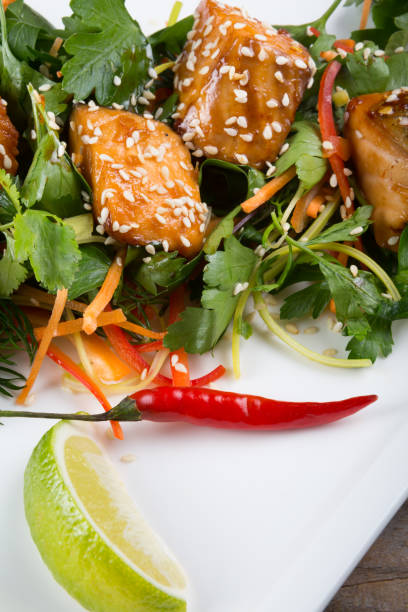 istock Salad with herbs and salmon 687868244