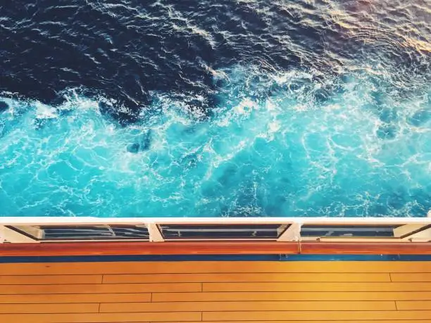 View looking down at the water from a cruise ship