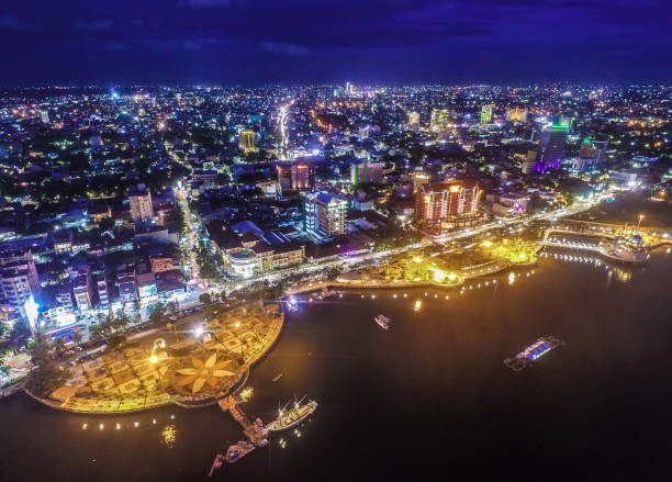 Losari Beach Makassar at Night An aerial drone view of Losari beach, the icon of the City of Makassar. The makassar stock pictures, royalty-free photos & images