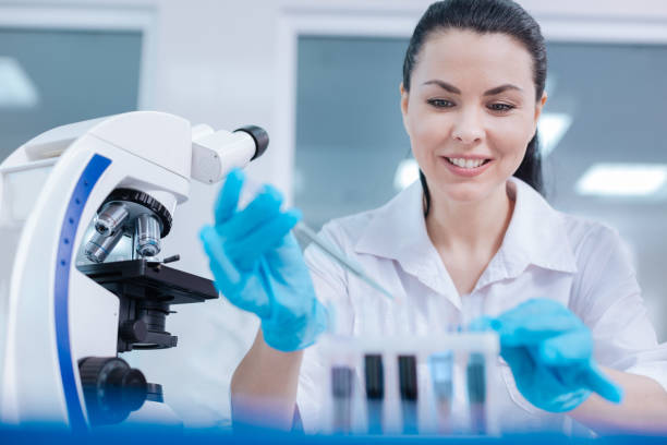 istock Smiling female scientist loving her job 687875706