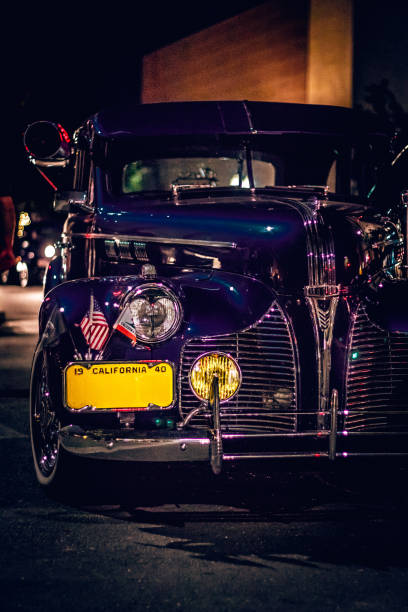 When Cars Were Classic Cars Parked, Cars Driving, Man Sitting on Car cruising hot rods stock pictures, royalty-free photos & images