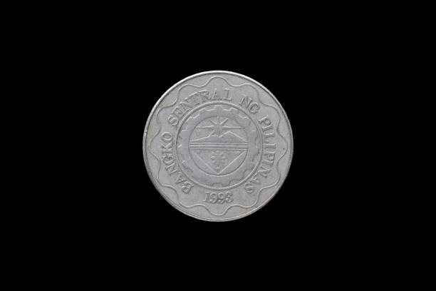 istock Philippine coins isolated on black background. 687886326