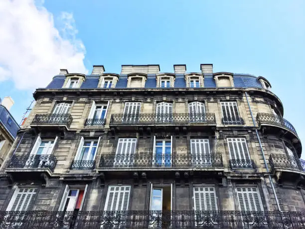 Old residential building in the city of Bordeaux, France.