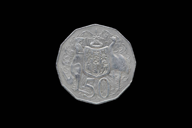 istock Half australian dollar coin isolated on black background. 687898448