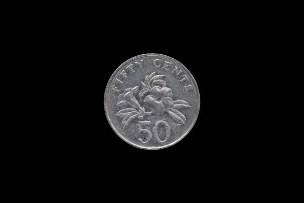 istock Singaporean 50 cent coin year 1995 isolated on black background. 687898554