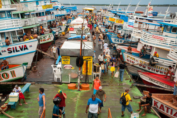 Colored boats in Manaus harbor - Amazon stock photo