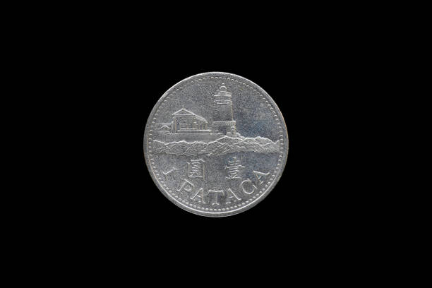 istock 1 PATACA Macanese coin year 1998 isolated on black background. 687909616