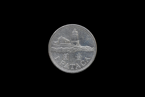 1 PATACA Macanese coin year 1998 isolated on black background.